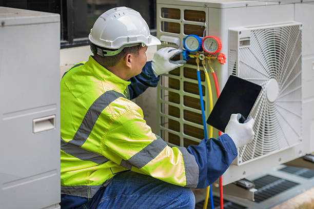Professional Air Conditioning Repair technician working in Jordan, NY
